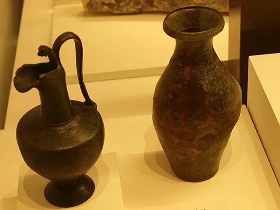 A pair of 1st century BC bronze Italic jugs (Malaga Archaeological Museum)