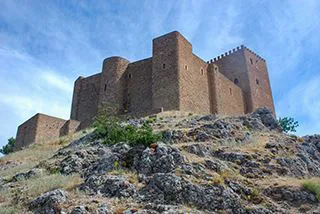 Looking up to Sierra Segura Castle